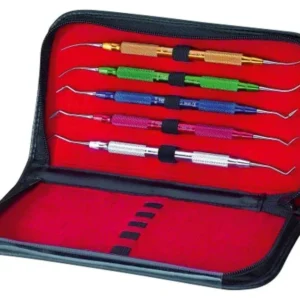 Aufwachsinstrumente-Set mit farbcodierten Griffen in geöffneter Etuiansicht.